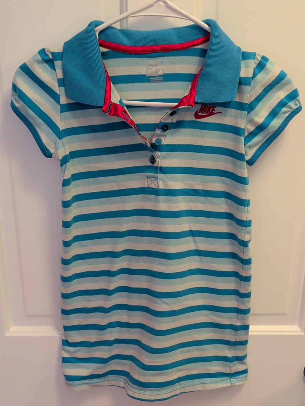 Nike Girls' Teal and Light Blue Striped Polo with Pink Accents